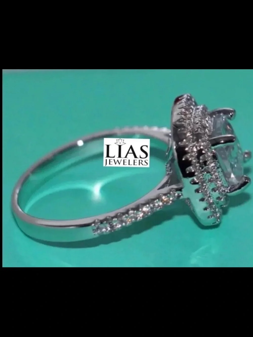 New 18k white gold engagement ring